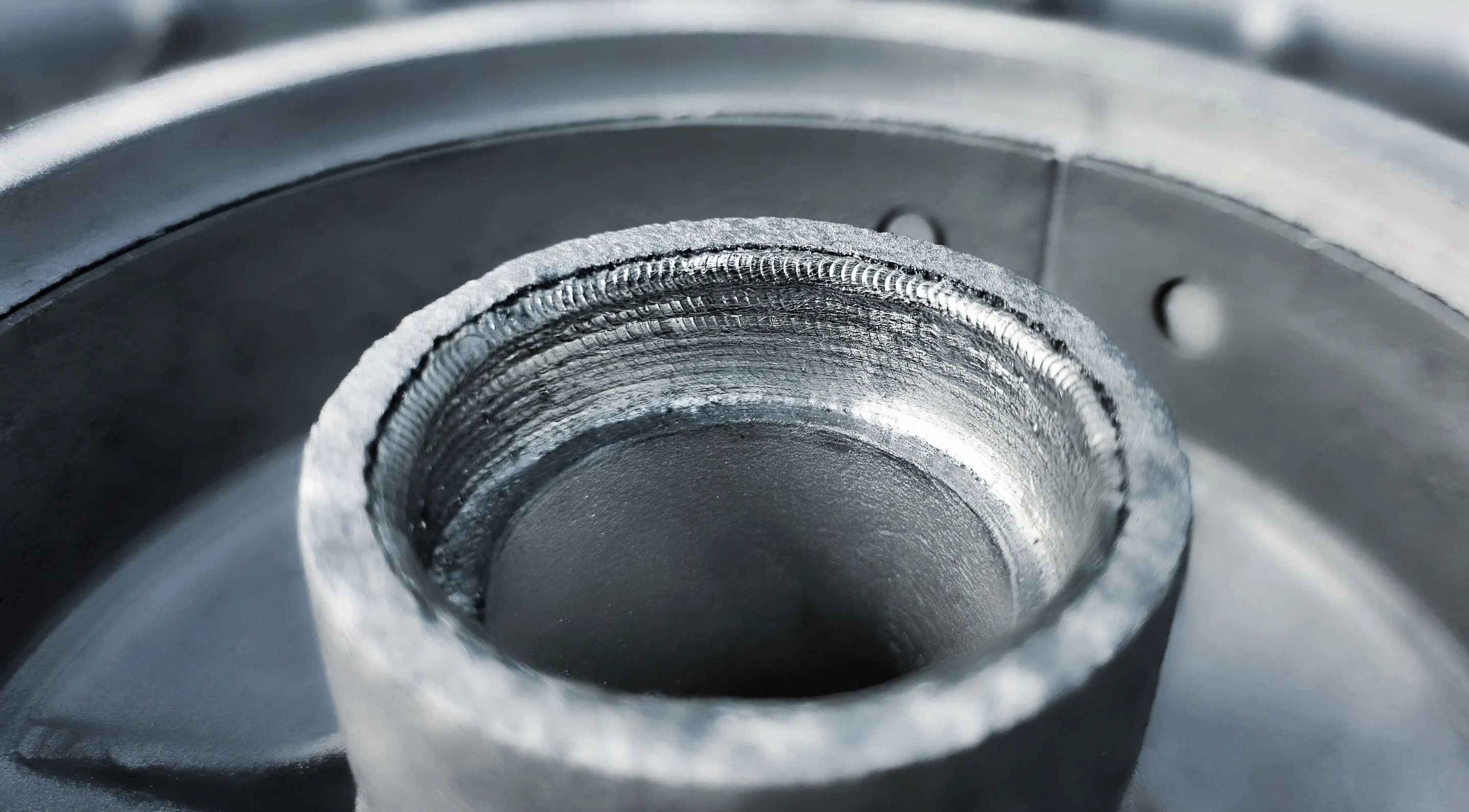 Detailaufnahme einer Lagersitz-Reparatur mittels Laserschweißen